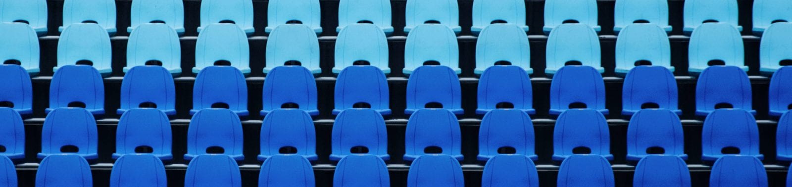 blue chairs in an auditorium